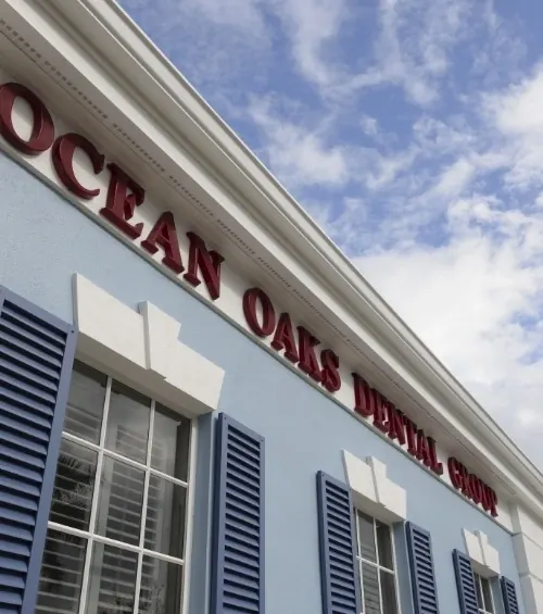 Ocean Oaks Dental Group lettered across the front of the building.